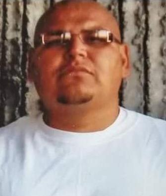John Komotios death by force case profile photo